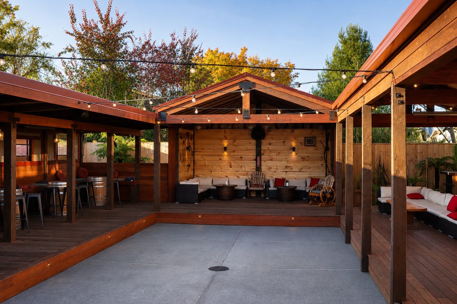 The Cliff courtyard at golden hour - covered seating, fireplace and sunken dance floor